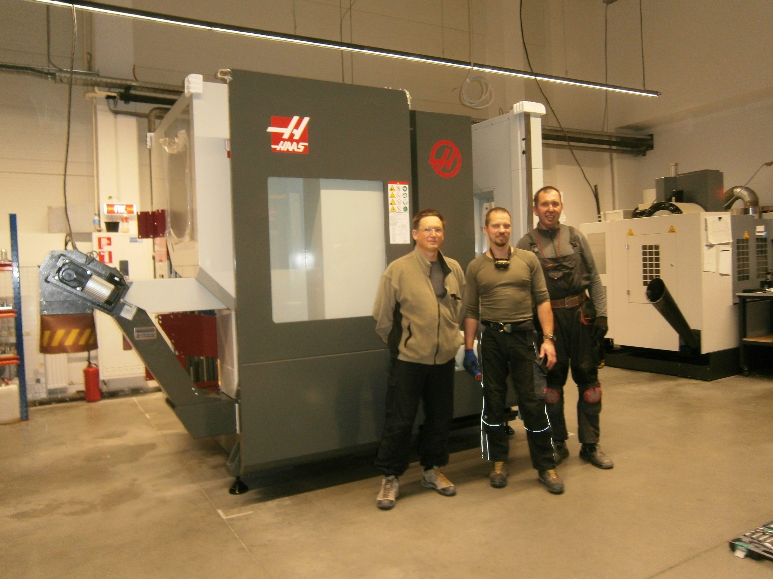 разгрузка станка с ЧПУ